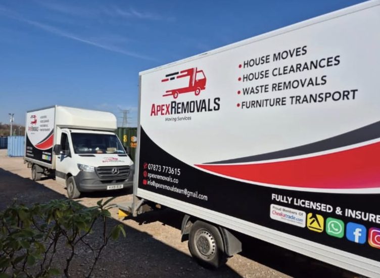 Close-up of a branded Apex Removals van with a second van behind on a house move